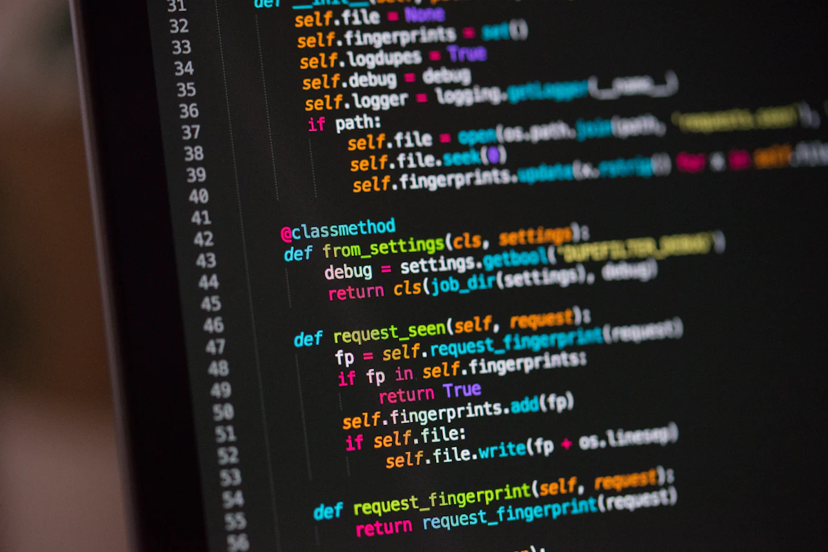 Close-up of a monitor showing website source code, the kind of HTML a search crawler reads